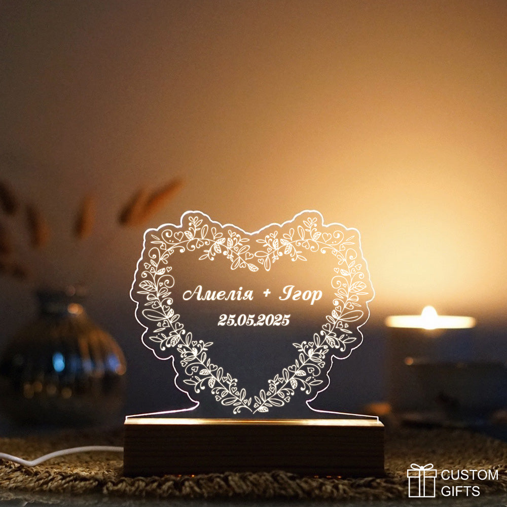 Personalized floral heart night light with custom names and date for special occasions.